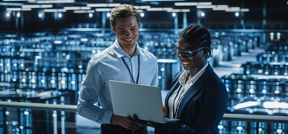 two people working in an it infrastructure