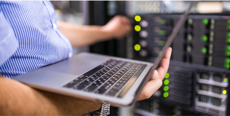 technician doing IT hardware maintenance on server